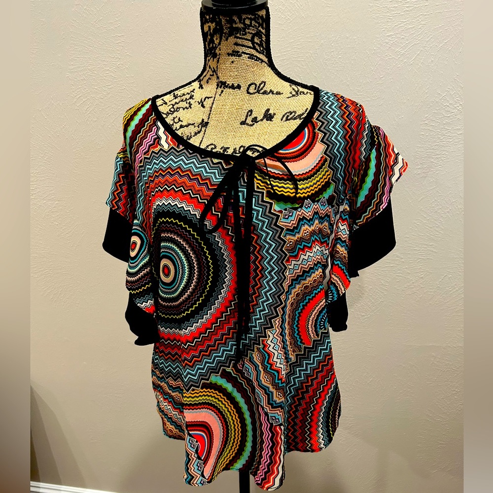 Joseph Ribkoff to size 4. Multi color fall colors excellent condition non smoke